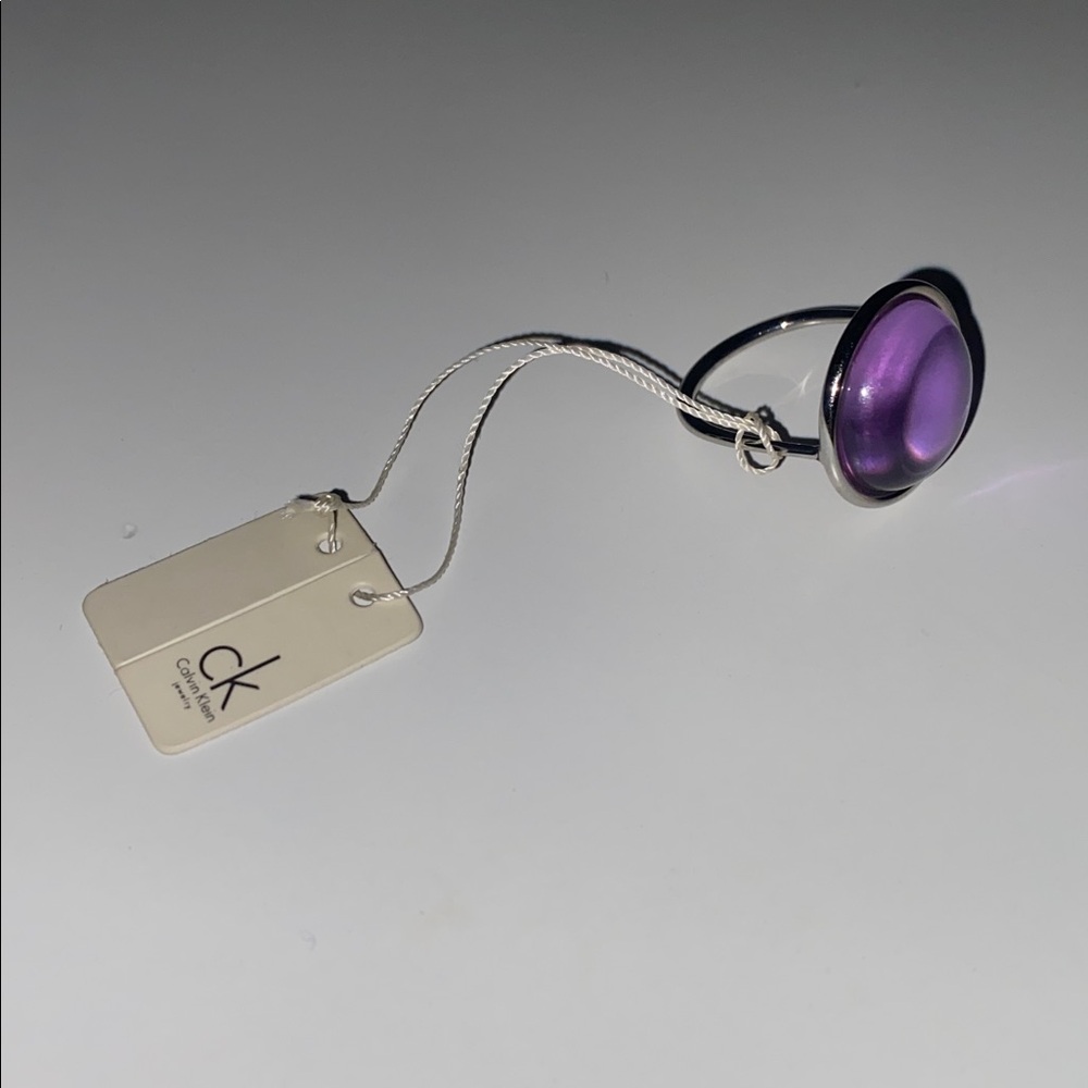 Calvin Klein Stainless Steel Silver Ring with Purple Stone